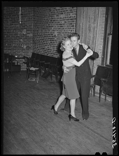 Young couple dancing at Jaycee buffet supper and party. Eufaula, Oklahoma