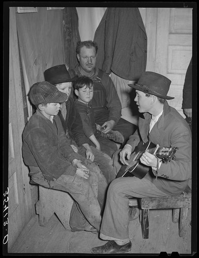 Untitled photo, possibly related to: Guitar player and singers at play party in McIntosh County, Oklahoma. See general caption number 26