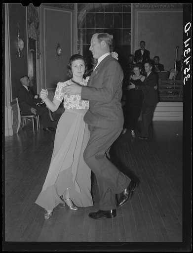 Couple dancing the schottische at a dance during the San Angelo Fat Stock Show. San Angelo, Texas