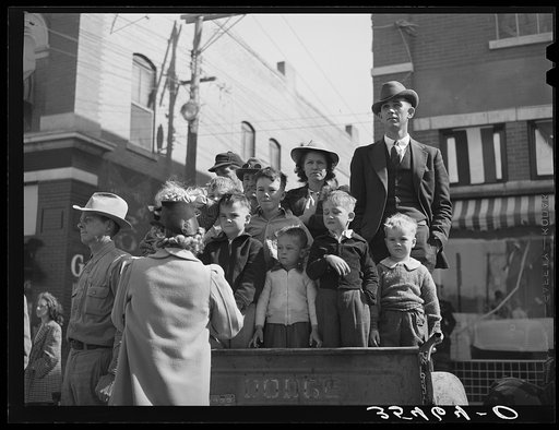 Watching the parade which opened the San Angelo Fat Stock Show. San Angelo, Texas