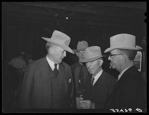 Cattlemen at the show barn. San Angelo Fat Stock Show, San Angelo, Texas