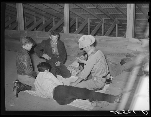 Boys in a crap game while at the San Angelo Fat Stock Show. San Angelo, Texas
