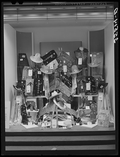 Show window in department store in San Angelo, Texas, during the San Angelo Fat Stock Show. Townspeople adopt rodeo and ranchmen styles during the stock show
