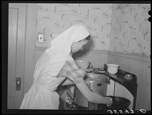 Untitled photo, possibly related to: FSA (Farm Security Administration) supervisor demonstrating canning with a pressure cooker before a group of FSA supervisors and officials at a district meeting. San Angelo, Texas
