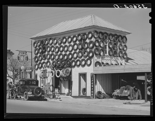 Untitled photo, possibly related to: Secondhand tires displayed for sale. San Marcos, Texas