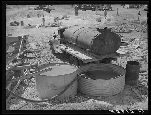 Water tank truck at road workers' camp in Menard County, Texas