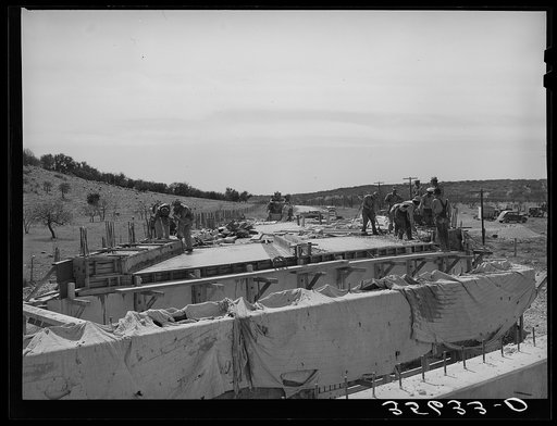 Road workers building a bridge in Menard County, Texas