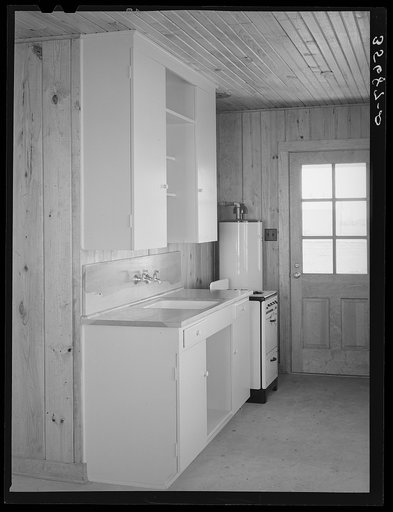 Detail of kitchen in house for permanent agricultural workers at the migratory labor camp. Robstown, Texas