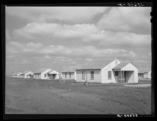 Houses for permanent agricultural workers at migratory labor camp. Robstown, Texas