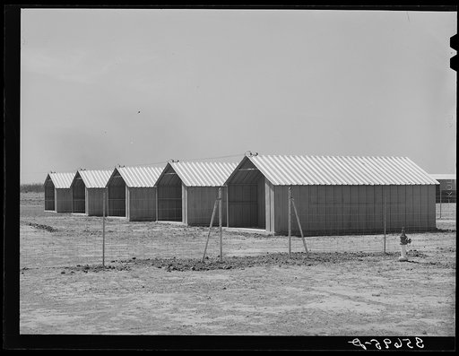 Sheet metal isolation units at the migratory labor camp. Sinton, Texas. These will be used for isolation of people at the camp with contagious diseases of a temporary nature