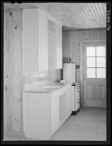 Untitled photo, possibly related to: Detail of kitchen in house for permanent agricultural workers at the migratory labor camp. Robstown, Texas
