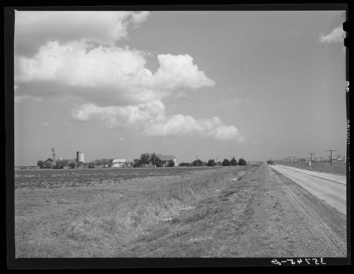 Farmstead along main highway in coastal plains of Texas. San Patricio County, Texas