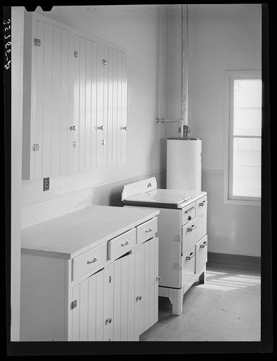 Kitchen in the community building at the migratory labor camp. Robstown, Texas