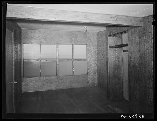 Upstairs bedroom and closet in multi-family unit for permanent agricultural workers at the migratory labor camp. Sinton, Texas