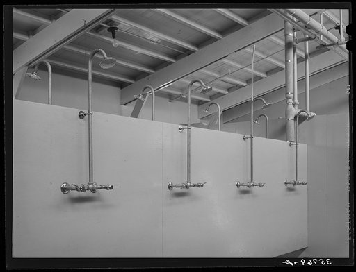 Showers for men. Sanitary unit at the migratory labor camp. Sinton, Texas