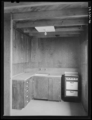 Kitchen in one of the multi-family units for permanent agricultural workers at the migratory labor camp. Sinton, Texas
