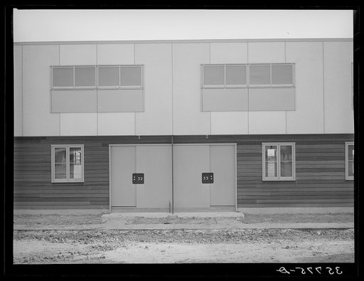 Entrances to multi-family units designed for permanent agricultural workers at the migratory labor camp. Sinton, Texas