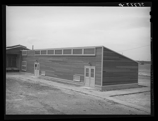 Shower room at the migratory labor camp. Sinton, Texas