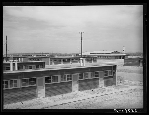 Row shelters for migratory workers at the migratory labor camp. Sinton, Texas