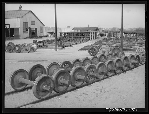 Car wheels and general equipment lot at railroad yard in Big Spring, Texas