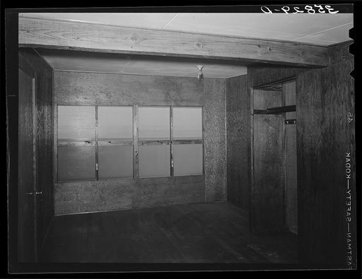 Untitled photo, possibly related to: Upstairs bedroom and closet in multi-family unit for permanent agricultural workers at the migratory labor camp. Sinton, Texas