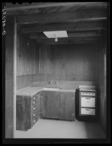 Kitchen in the multi-family unit for permanent agricultural workers at the migratory labor camp. Sinton, Texas