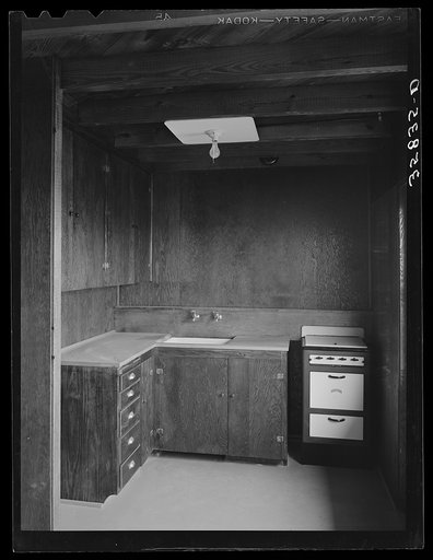 Untitled photo, possibly related to: Kitchen in the multi-family unit for permanent agricultural workers at the migratory labor camp. Sinton, Texas
