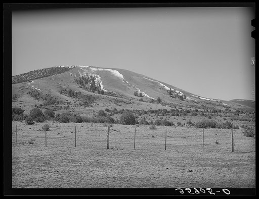Untitled photo, possibly related to: Spring snow on mountains provide water for the range below. Apache County, near Springerville, Arizona