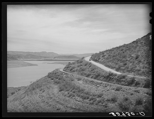 Reservoir of Roosevelt Dam with irrigation ditches and highway. Gila County, Arizona