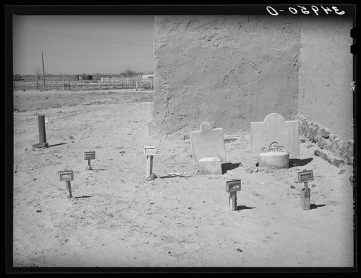 Grave in graveyard of Catholic church. Bernalillo County, New Mexico