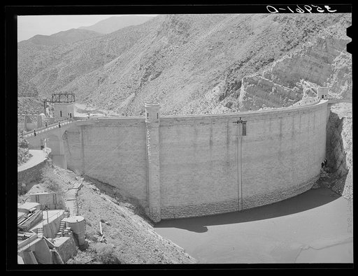 Untitled photo, possibly related to: Roosevelt Dam showing small amount of impounded water because of extended drought. This is the main source of water for irrigation in the Salt River Valley. Gila County, Arizona