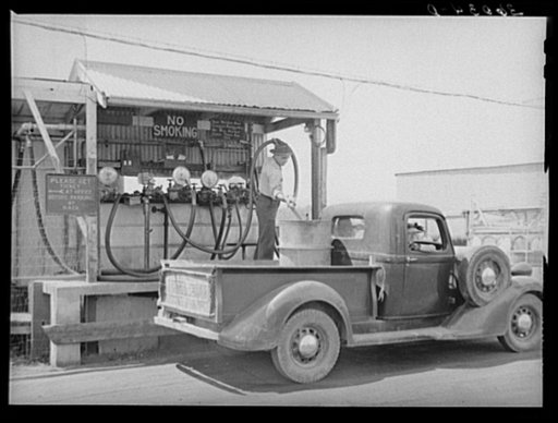 Member of the United Producers and Consumers Cooperative having a drum filled with gasoline at the warehouse. Phoenix, Arizona