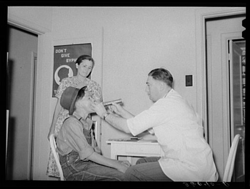 Examination by doctor at the clinic of the Agua Fria migratory labor camp. Arizona