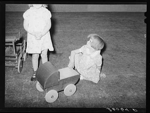 Child of agricultural worker playing in the WPA (Work Projects Administration) nursery school at the Agua Fria migratory labor camp. Arizona
