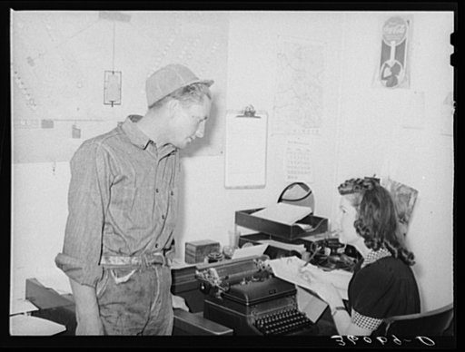 Migratory agricultural worker checking out of the Agua Fria migratory labor camp. Arizona
