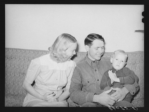Member of the Arizona part-time farms with his wife and child. Maricopa County, Arizona. Chandler Unit
