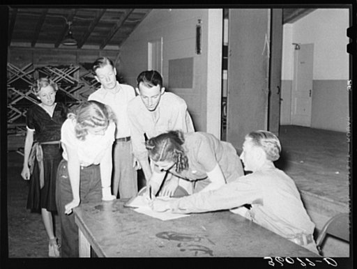 New members signing up at the young people's club at the Agua Fria migratory labor camp. Arizona