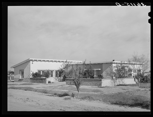 Community building at Arizona part-time farms. Chandler Unit, Maricopa County, Arizona. This building has an auditorium, kitchen, restrooms and laundry room
