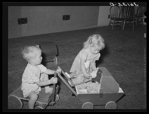 Children of agricultural laborers playing at the WPA (Work Projects Administration) nursery school at the Agua Fria migratory labor camp. Arizona
