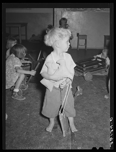 Little boy at the WPA (Work Projects Administration) nursery school at the Agua Fria migratory labor camp. Arizona