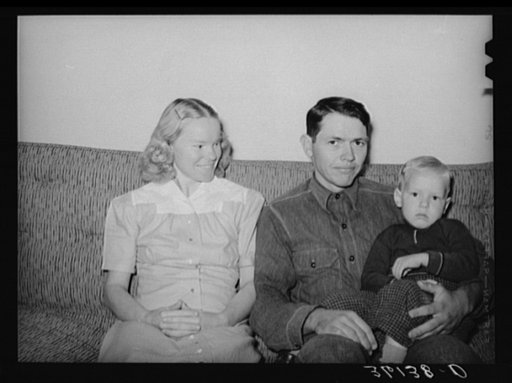 Untitled photo, possibly related to: Member of the Arizona part-time farms with his wife and child. Maricopa County, Arizona. Chandler Unit