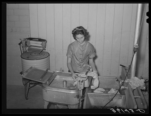 Doing the laundry at the Agua Fria migratory labor camp. Arizona