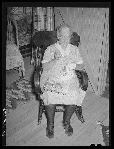 Mother of tenant purchase client piecing a quilt. Maricopa County, Arizona