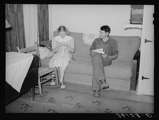 Member of the Arizona part-time farms, Chandler Unit, Maricopa County, Arizona, and his wife in their apartment