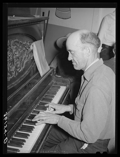 Migratory laborer, pianist of the camp orchestra. Agua Fria migratory labor camp, Arizona