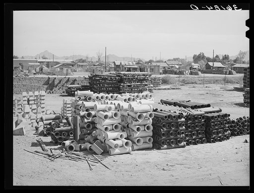 Tile fence posts and brick are standard part of stock of the United Producers and Consumers Cooperative. Phoenix, Arizona