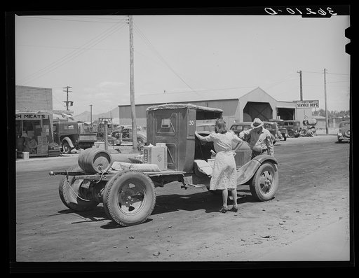 Untitled photo, possibly related to: Farmer with his truck loaded with goods which he has bought from the United Producers and Consumers Cooperative. Phoenix, Arizona