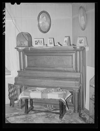 Corner of living room in farm home of tenant purchase client in Maricopa County, Arizona