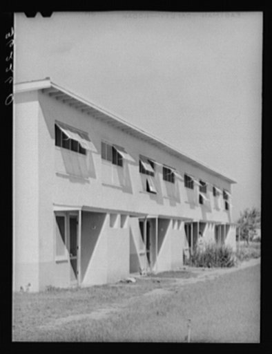 Front of apartment house on the Arizona part-time farms. Chandler Unit, Maricopa County, Arizona