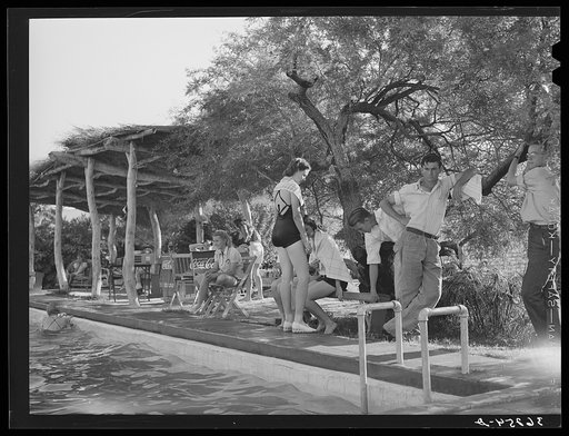 At the side of the swimming pool at dude desert ranch. Coolidge, Arizona